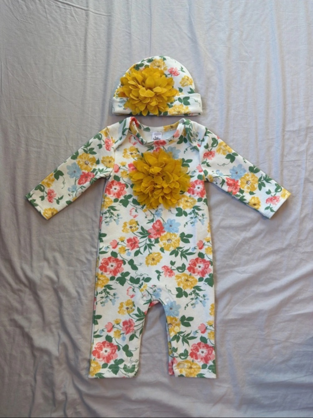 Baby Essentials Floral One-Piece with Yellow Flower Accent and Matching Hat